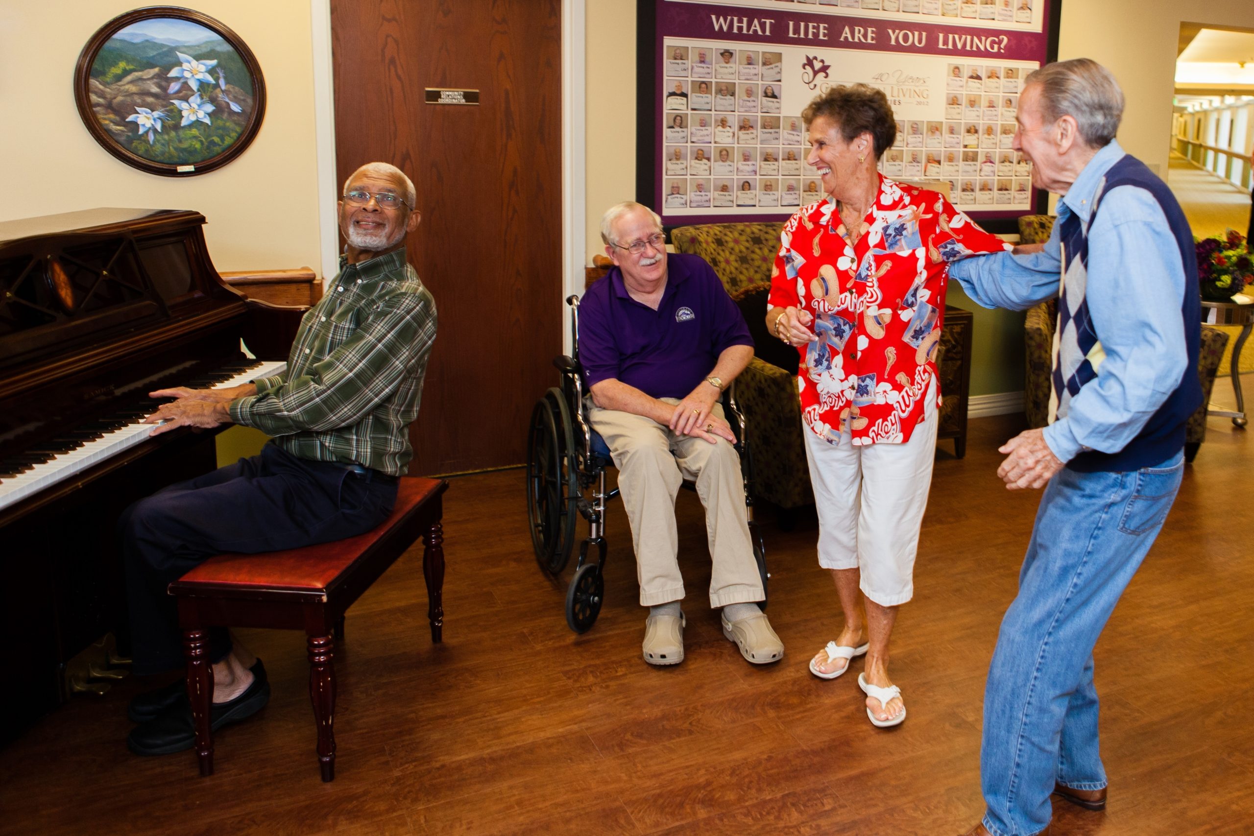 Someren Glen Senior Living Community in Centennial, CO - residents enjoying live piano player largelandscape